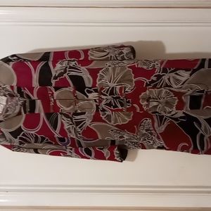 Women's long sleeved sheer jacket or can be worn with a dress underneath a dress